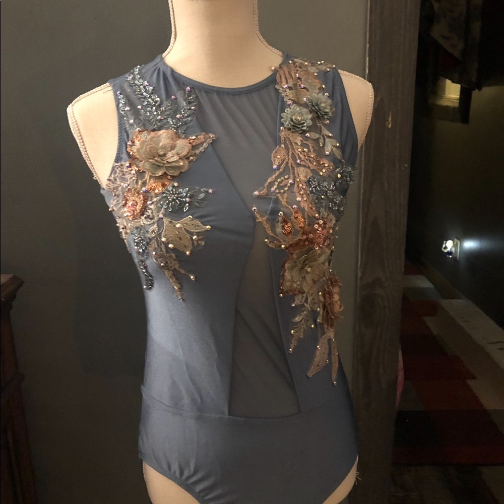Plum Patrick J Leo. Custom stones and appliqués.